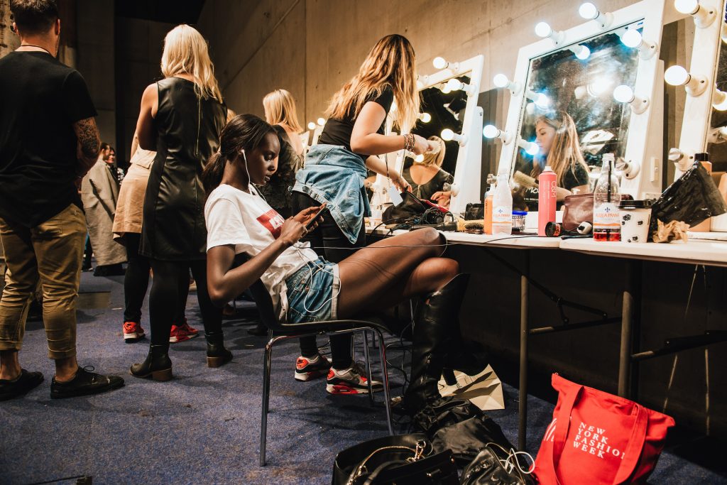 Model backstage at a fashion show