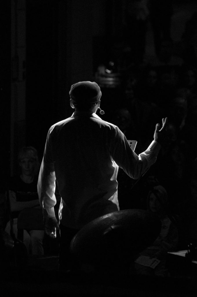 A speaker on stage