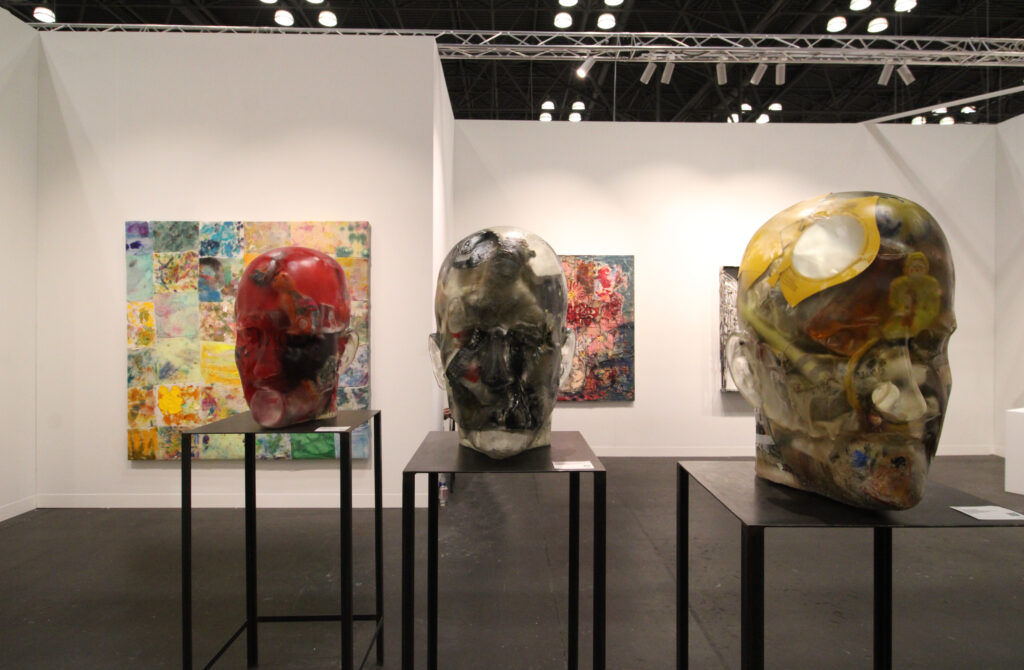 A snapshot of works from artist Richard DuPont's "Resin Heads" series at the Secci Gallery booth; photo: Benjamin Imhoff for Manic Metallic
